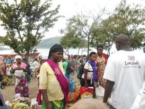 Rubona market day holds great appeal even with people from DR Congo who row across Lake Kivu for the day